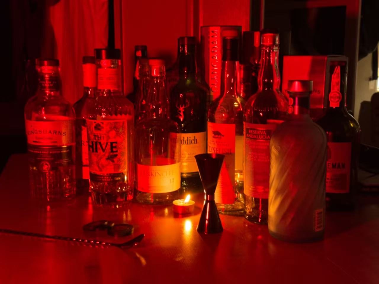 A red-lit bar counter